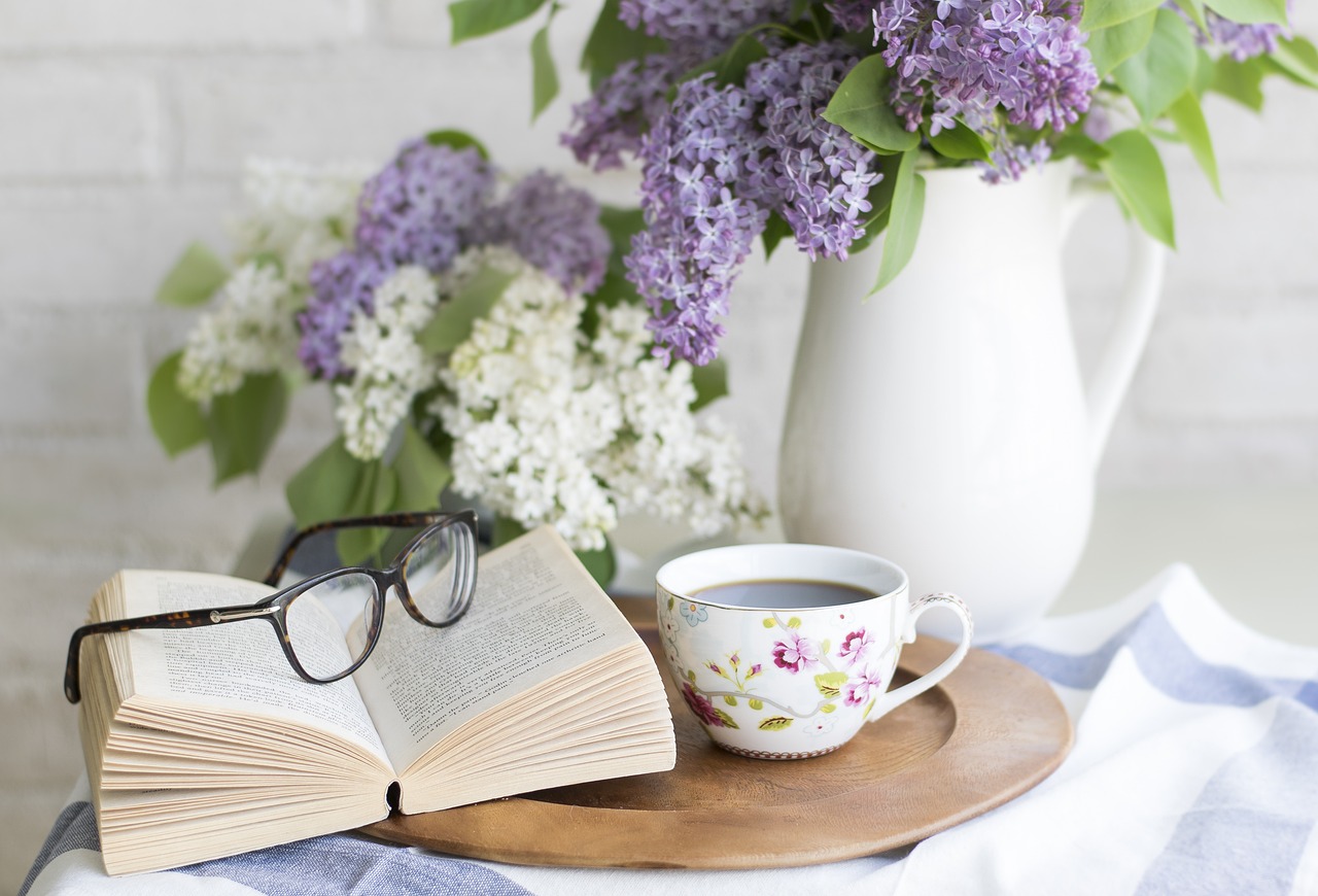 Coffee, book, flowers — Affordable Cladding Panels to Upgrade Homes, Bathrooms, and Kitchens