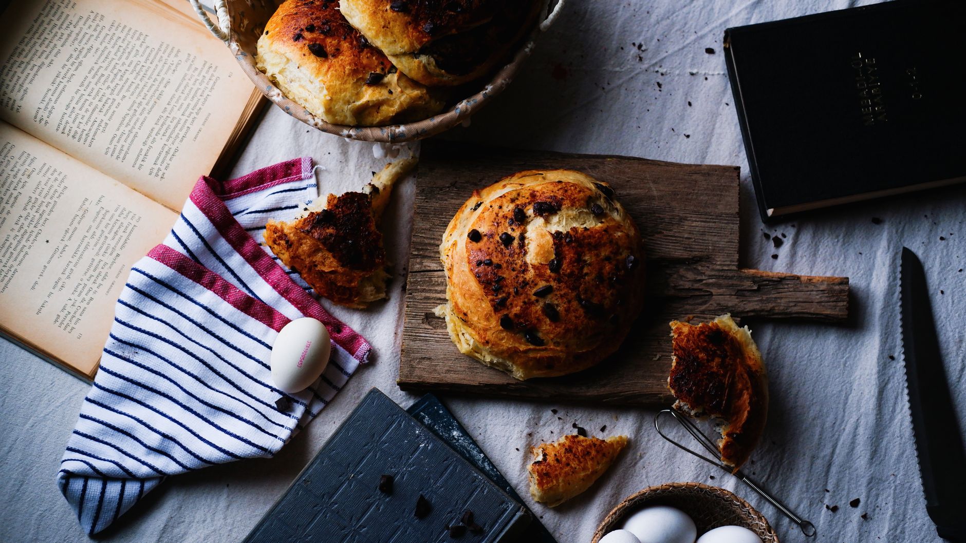 A cozy rustic breakfast setting featuring freshly baked bread and eggs, perfect for a homely meal. — Explaining Why Superfood